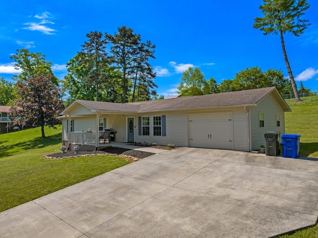 ranch-style house featuring a garage, concrete driveway, a porch, and a front lawn