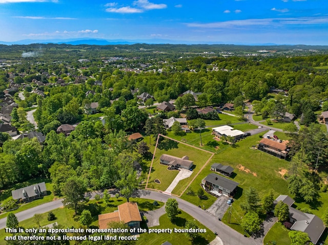 aerial view with a mountain view and a residential view