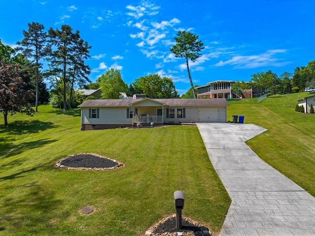 view of front of property with a porch, crawl space, driveway, a front yard, and an attached garage