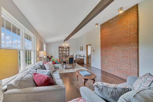 living room with vaulted ceiling with beams, dark hardwood / wood-style floors, and an inviting chandelier