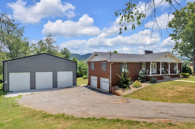 ranch-style home with a front lawn and a porch