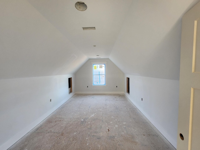 bonus room featuring lofted ceiling