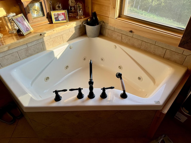 bathroom with a tub to relax in