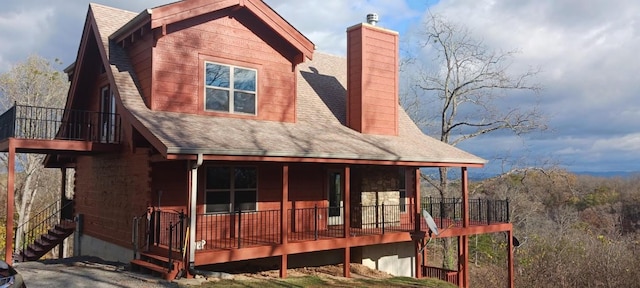 back of house with covered porch