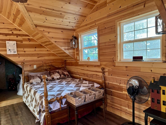 bedroom with hardwood / wood-style floors, wood walls, and wood ceiling