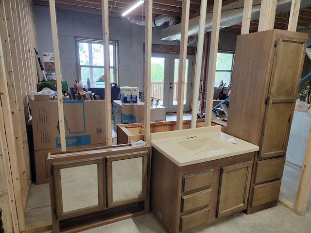 bathroom featuring washer / dryer