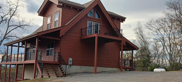 view of property exterior with a balcony