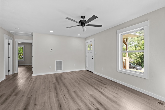 126 Double Cave Rd, Rutledge, TN 37861 - unfurnished living room with wood finished floors, recessed lighting, a ceiling fan, and attic access