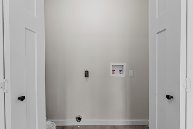 126 Double Cave Rd, Rutledge, TN 37861 - laundry area with hookup for a washing machine, wood finished floors, and hookup for an electric dryer