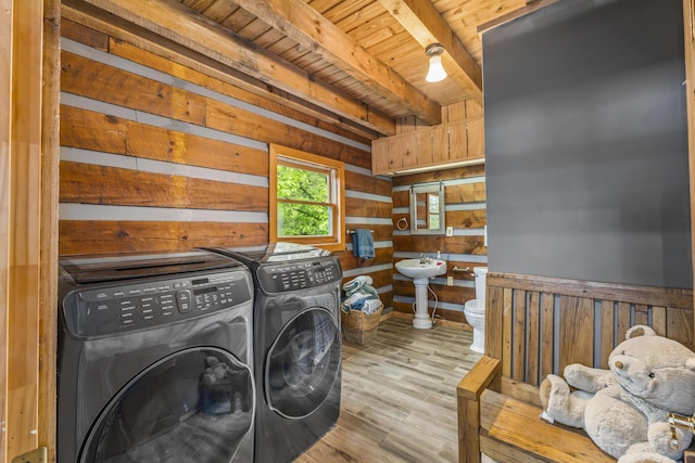 7868 Saint Clair Rd, Whitesburg, TN 37891 - laundry area featuring washer and clothes dryer, wood walls, wood ceiling, and wood finished floors