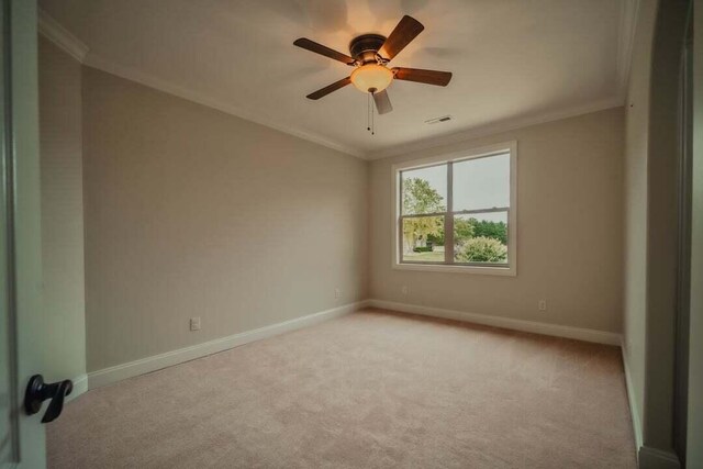118 Luxury Ln, Dandridge, TN 37725 - unfurnished room featuring light colored carpet, baseboards, ornamental molding, and ceiling fan