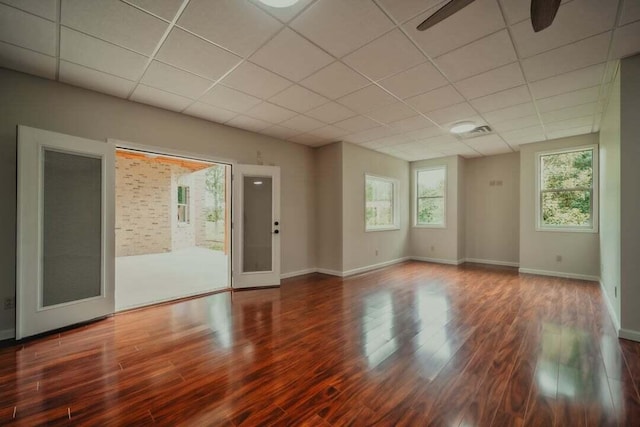118 Luxury Ln, Dandridge, TN 37725 - spare room with a drop ceiling, wood finished floors, baseboards, and a ceiling fan
