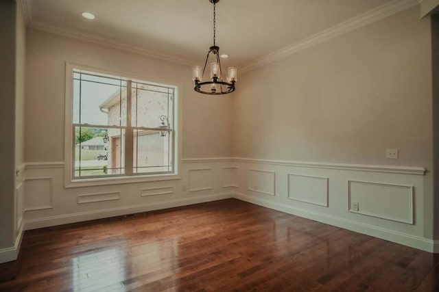 118 Luxury Ln, Dandridge, TN 37725 - unfurnished room with a chandelier, ornamental molding, dark wood finished floors, wainscoting, and a decorative wall