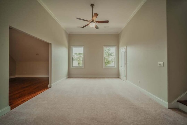 118 Luxury Ln, Dandridge, TN 37725 - spare room featuring carpet, ornamental molding, a ceiling fan, and baseboards