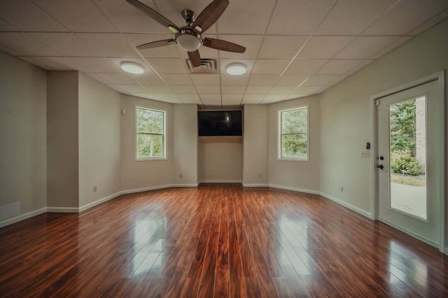 118 Luxury Ln, Dandridge, TN 37725 - spare room featuring plenty of natural light, a ceiling fan, wood finished floors, baseboards, and a paneled ceiling