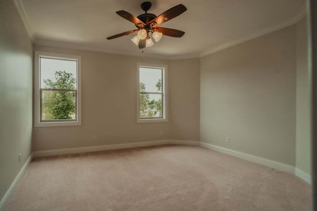 118 Luxury Ln, Dandridge, TN 37725 - unfurnished room featuring crown molding, light carpet, healthy amount of natural light, baseboards, and a ceiling fan