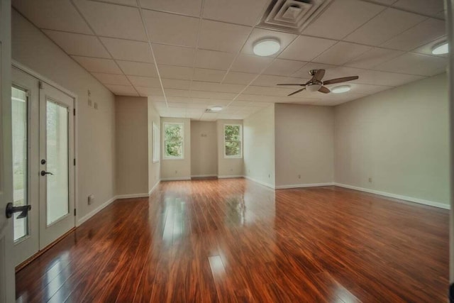 118 Luxury Ln, Dandridge, TN 37725 - unfurnished room with wood finished floors, a drop ceiling, baseboards, a ceiling fan, and french doors