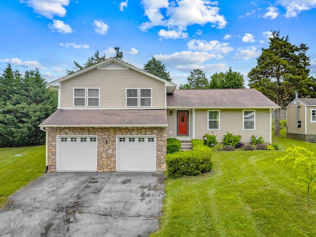 5715 Academy Dr, Morristown, TN 37814 - split level home with asphalt driveway, stone siding, a front yard, and an attached garage