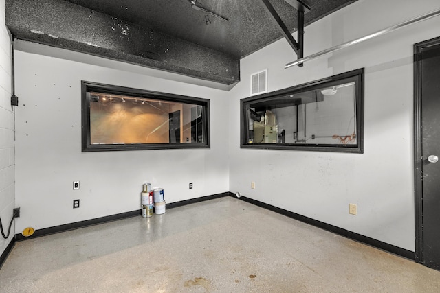 5715 Academy Dr, Morristown, TN 37814 - empty room with baseboards and speckle patterned floor