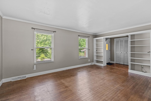 5715 Academy Dr, Morristown, TN 37814 - unfurnished bedroom featuring hardwood / wood-style floors, crown molding, and baseboards