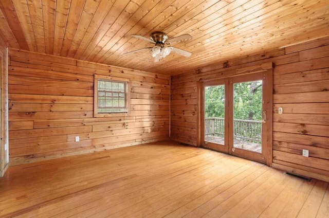 1370 Flat Woods Rd, Dandridge, TN 37725 - unfurnished room featuring wood ceiling, a ceiling fan, wood walls, and light wood-type flooring