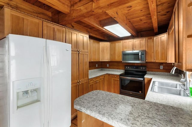 1370 Flat Woods Rd, Dandridge, TN 37725 - kitchen with white refrigerator with ice dispenser, stainless steel microwave, black electric range oven, a wooden ceiling with exposed beams, and light countertops