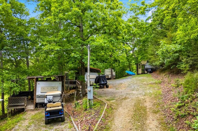 1370 Flat Woods Rd, Dandridge, TN 37725 - view of yard featuring dirt driveway and a carport