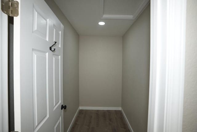 hall with recessed lighting, baseboards, and dark wood finished floors