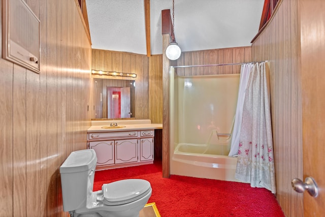 full bathroom with toilet, wood walls, a textured ceiling, vanity, and shower / bath combo with shower curtain