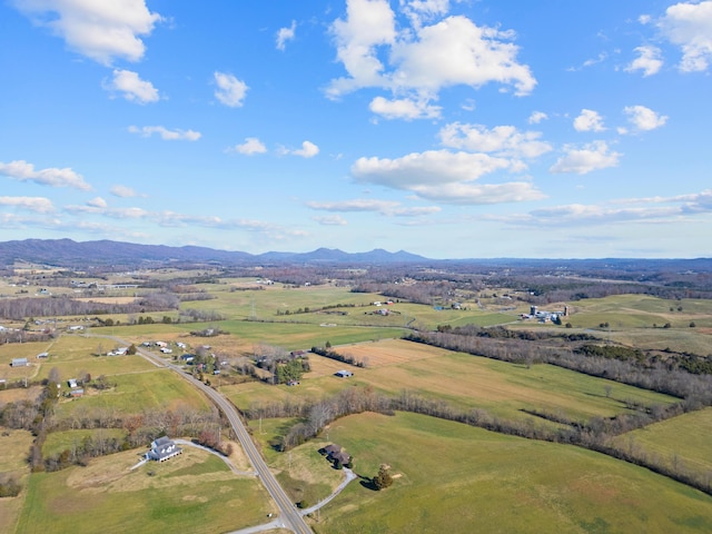 bird's eye view with a mountain view and a rural view