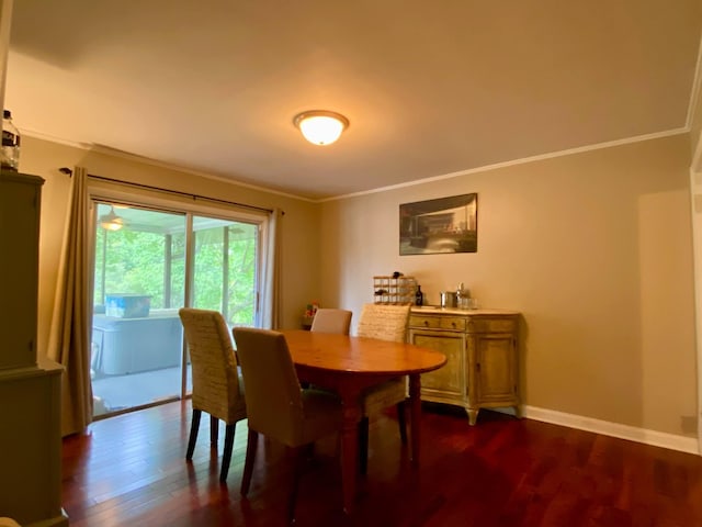1578 Golf Course Rd, Newport, TN 37821 - dining room featuring crown molding, dark wood finished floors, and baseboards