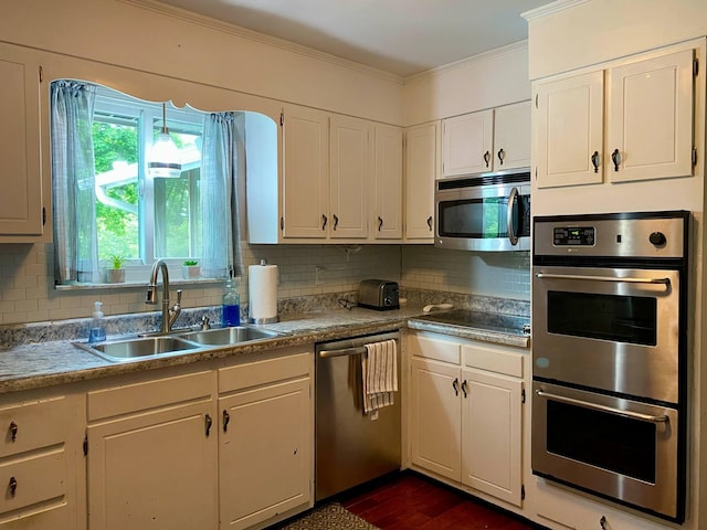 1578 Golf Course Rd, Newport, TN 37821 - kitchen featuring stainless steel appliances, a sink, ornamental molding, backsplash, and dark wood finished floors