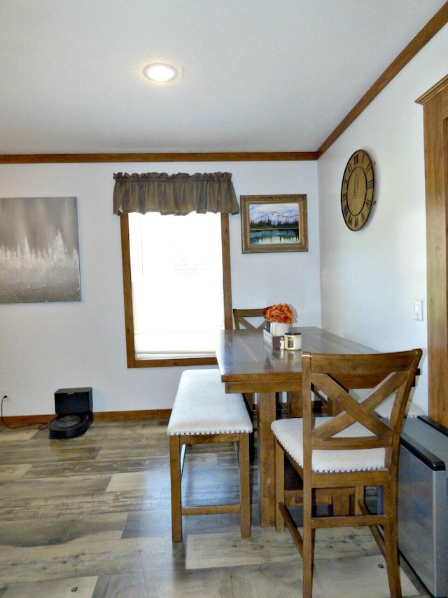 2115 Rambling Rose Ln, Jefferson City, TN 37760 - dining space with baseboards, ornamental molding, and wood finished floors