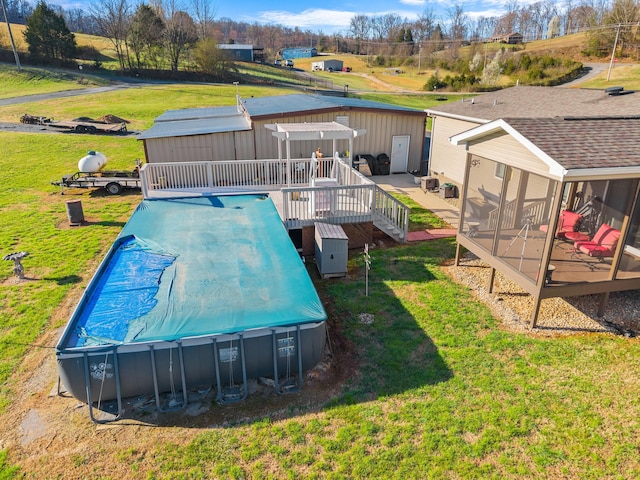 2115 Rambling Rose Ln, Jefferson City, TN 37760 - view of swimming pool featuring a wooden deck and a lawn