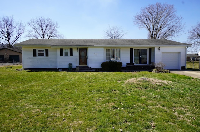 ranch-style home featuring a garage, a front yard, driveway, and entry steps