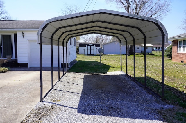 view of parking featuring a detached carport, driveway, a storage unit, and a garage