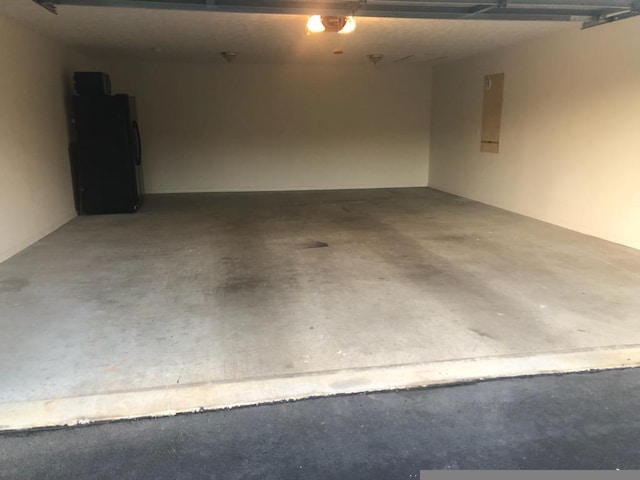 garage featuring refrigerator