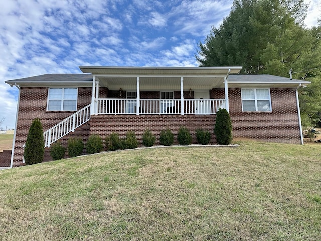 view of front of home with a front yard