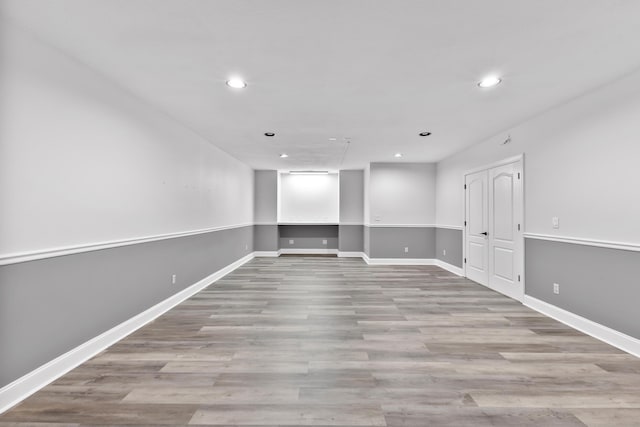 empty room with light hardwood / wood-style floors