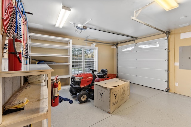 garage with electric panel and a garage door opener