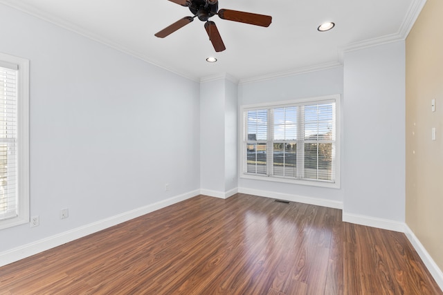 spare room featuring ceiling fan, dark hardwood / wood-style floors, and ornamental molding