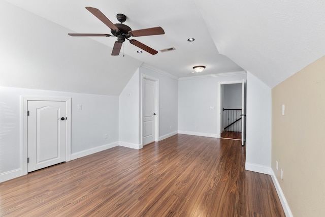 bonus room featuring ceiling fan, dark wood-type flooring, and lofted ceiling