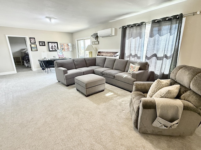 living room with a wall unit AC, baseboards, and light colored carpet