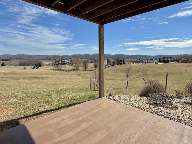 view of patio featuring a mountain view and a rural view