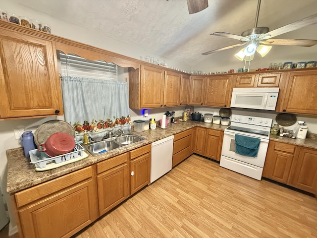 3500 Poor Valley Rd, Rutledge, TN 37861 - kitchen with white appliances, a sink, lofted ceiling, a ceiling fan, and light wood-type flooring