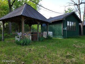 exterior space with a gazebo and a yard