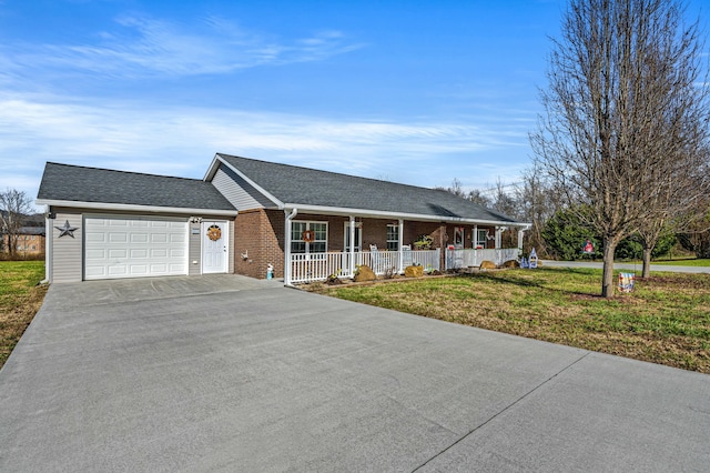 single story home with a front yard, a porch, and a garage