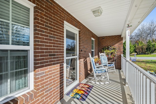 balcony featuring covered porch