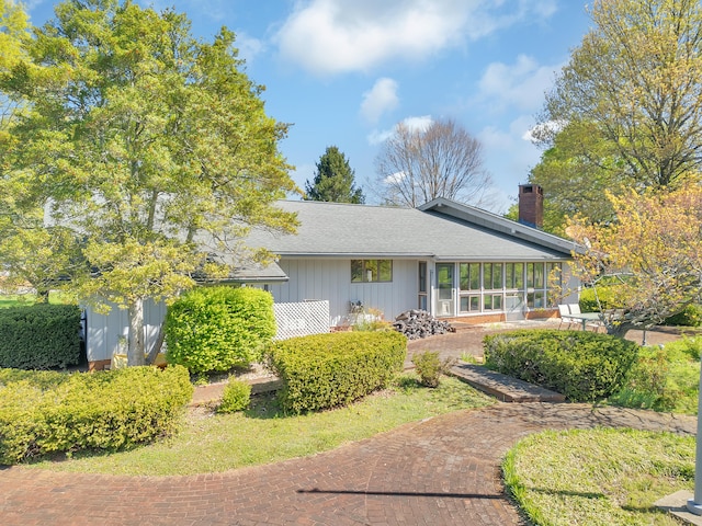 310 Par Ln, Greeneville, TN 37743 - rear view of house featuring a sunroom and a chimney