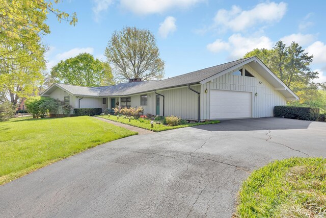 310 Par Ln, Greeneville, TN 37743 - ranch-style house with a garage, a chimney, driveway, and a front lawn